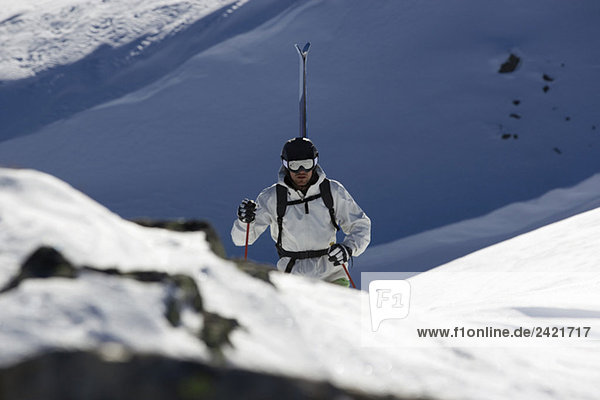 Austria  Arlberg  Albona  Man skiing in Alps