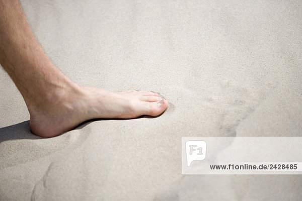 Foot in the sand