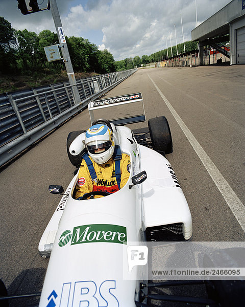 A driver in a racing car Astorp Sweden.