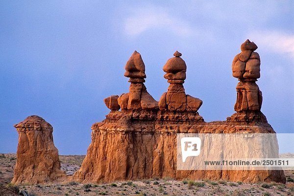 Eroded rock forms at sunset at Goblin Valley State Park  near the San Rafael Swell region  Utah  USA