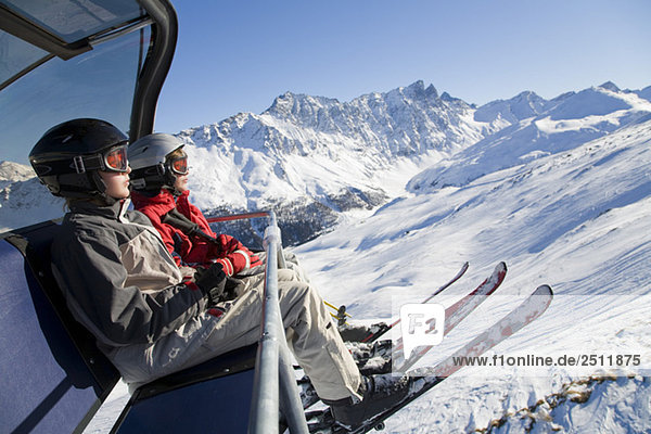 Switzerland  Graubuenden  Savognin  Children's (8-9) in ski lift