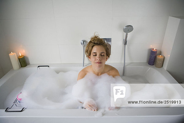 Woman in bathtub  relaxing