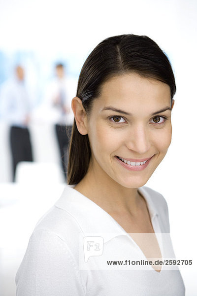 Young professional woman smiling at camera  portrait
