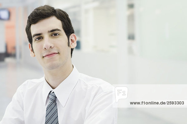 Businessman confidently looking at camera  portrait