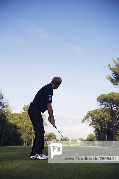 A Scandinavian man playing golf Turkey