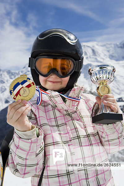 A girl with trophies