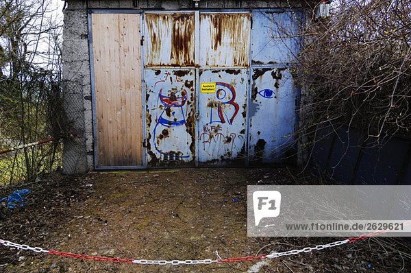 Germany  Bavaria  Munich  Garage door with graffiti