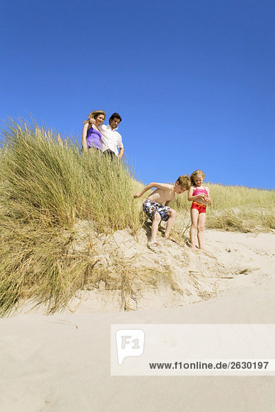 Germany  Baltic sea  Family in sand dunes