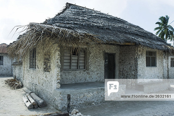 Tanzania  Zanzibar  house made of stone with thatched roof