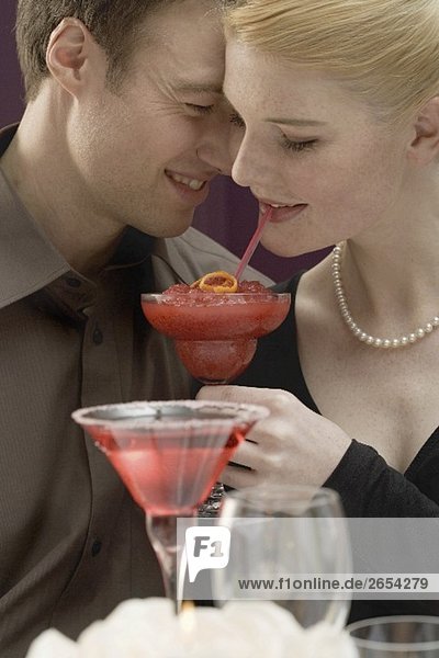 Romantic couple with drinks