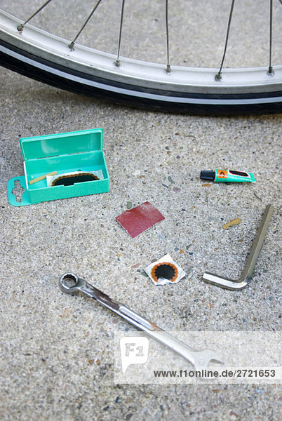 Bicycle repair kit and bicycle  elevated view