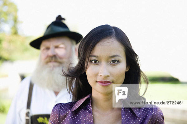 Upper   Young Asian woman and old n man