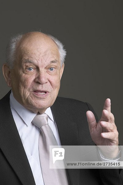 A senior man talking  portrait