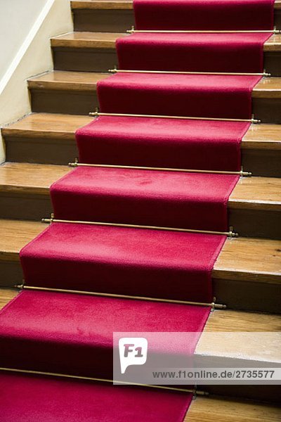 A red carpet on a staircase