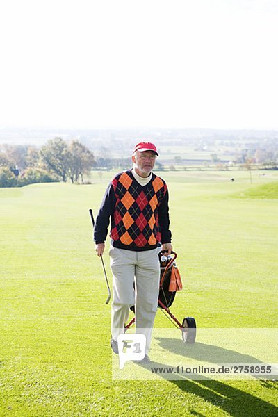 A senior man playing golf Sweden.