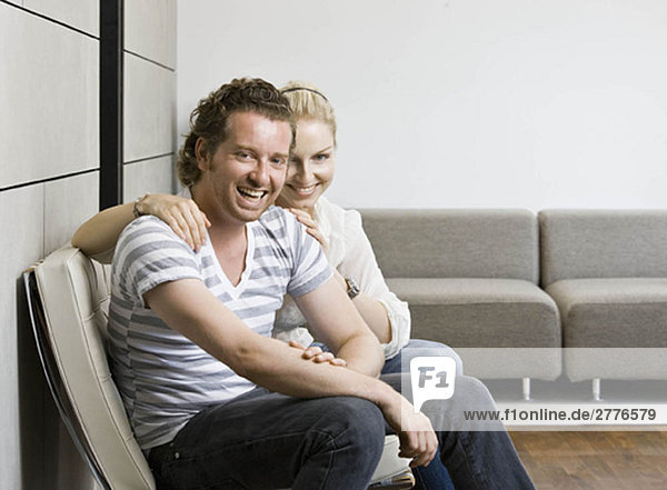 Man and woman in a living room
