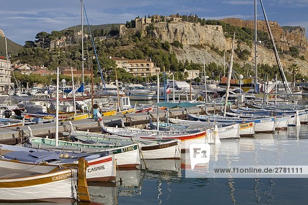 Boats docked at harbor  Cassis  Bouches-du-Rhone  Provence- Alpes-Cote d Azur  France