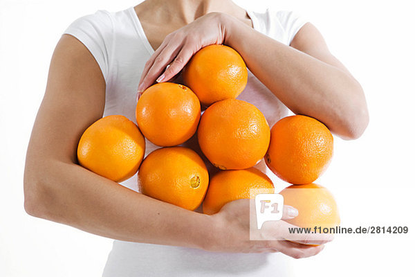 Woman holding oranges Sweden.