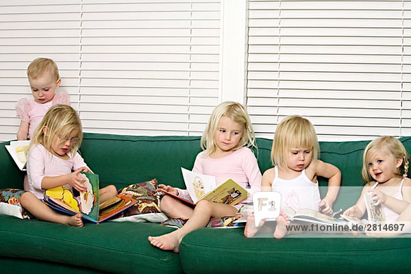 A blond Scandinavian girl drinking milk, Sweden. - SuperStock