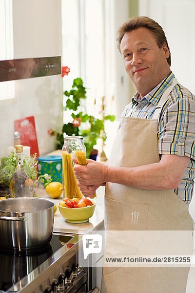 A man making dinner Sweden.
