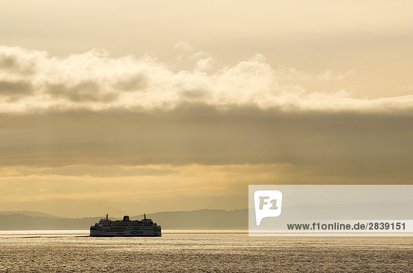 A BC ferry crosses the Strait of Georgia near Vancouver  British Columbia  Canada.