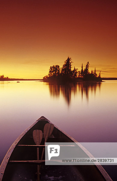 Canoe along lake Otter Falls Whiteshell Provincial Park Manitoba Canada.