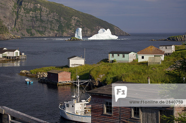 An iceberg stranded in the harbour of Old Bonaventure  Bonavista Peninsula  Trinity Bay  Discovery Trail  Newfoundland & Labrador  Canada.