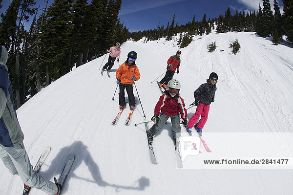 Family skiing together  Whistler Mountain  British Columbia  Canada.
