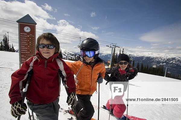 Young skiers on Whistler Mountain  British Columbia  Canada.