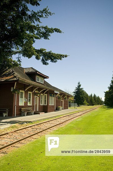 The train station at Qualicum Beach is one of the many stops that the E & N rail service picks up and drops off passengers while enroute from Victoria to the Comox Valley  Vancouver Island  British Columbia  Canada