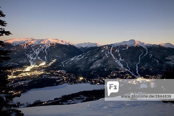 Whistler Village at dawn with Blackcomb Mountain and Whistler Mountain beyond  British Columbia  Canada