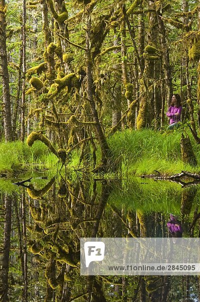 Woman in mossy swamp  Naikoon Provincial Park  Queen Charlotte Islands  British Columbia  Canada