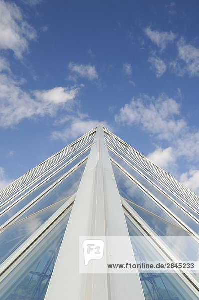 Glass pyramid against cloudy sky  Muttart Conservatory  Edmonton  Alberta  Canada