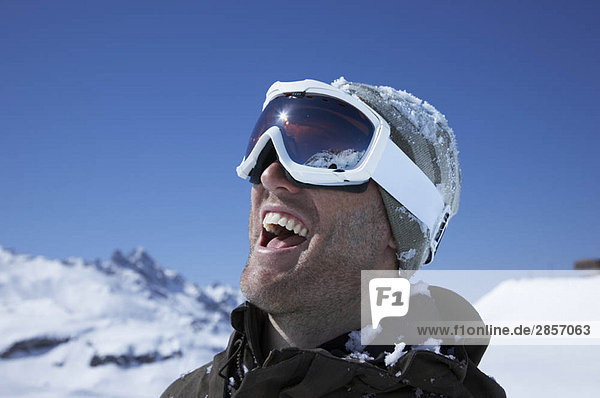 Portrait of man wearing ski goggles