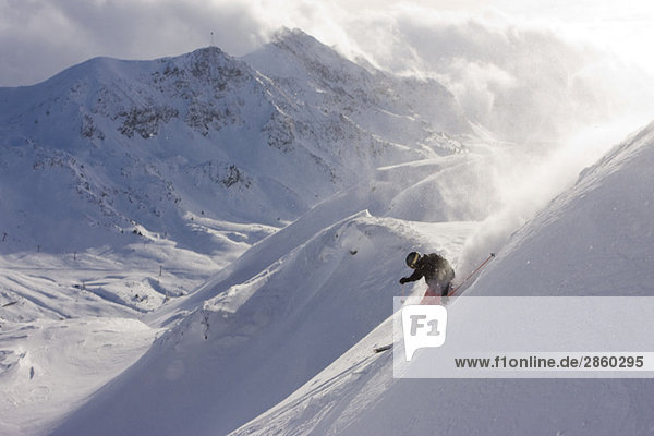 Austria  Obertauern  Person skiing on steep slope