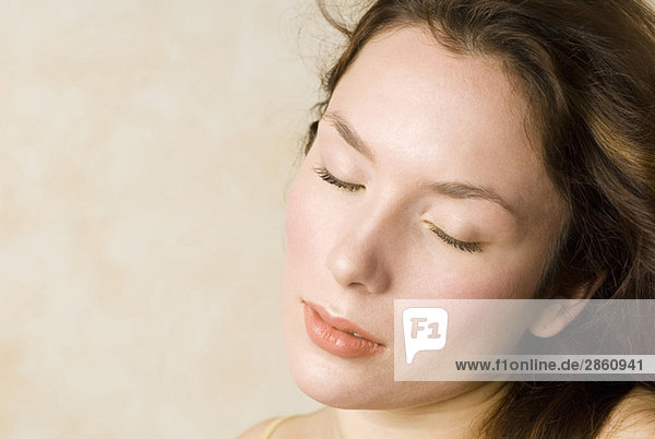 Young woman  Eyes closed  portrait  close up