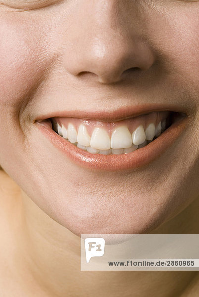 Young woman smiling  close up