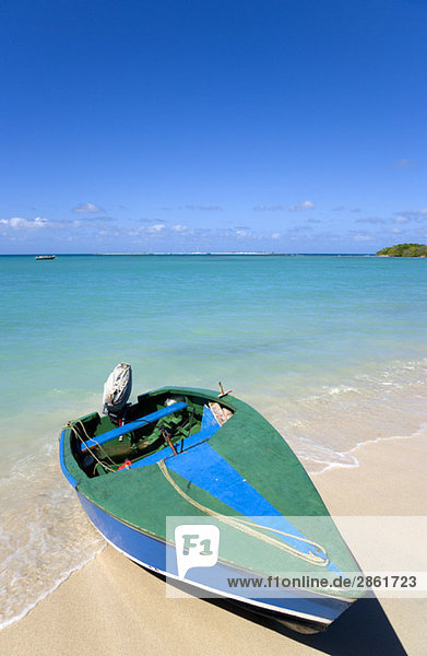 Grenada  Carriacou  Paradise Beach at L'Esterre  Mtorboat on Caribbean beach