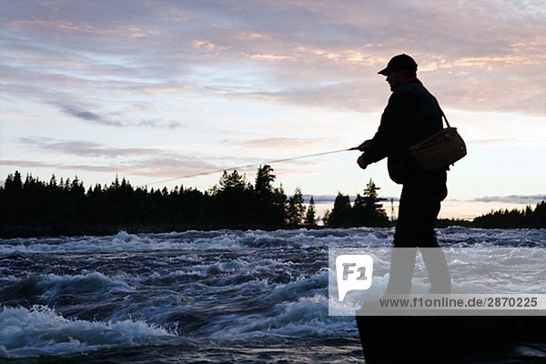 A man fishing Sweden.