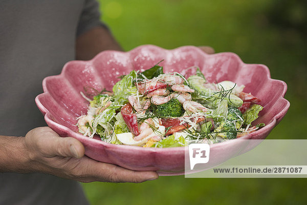 Shrimp salad in a pink bowl Sweden.