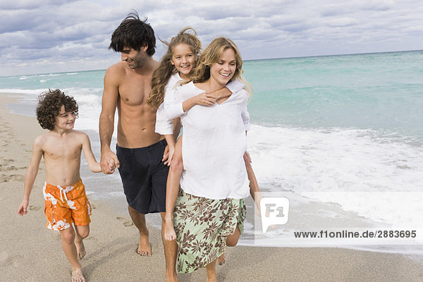 Family enjoying vacations on the beach