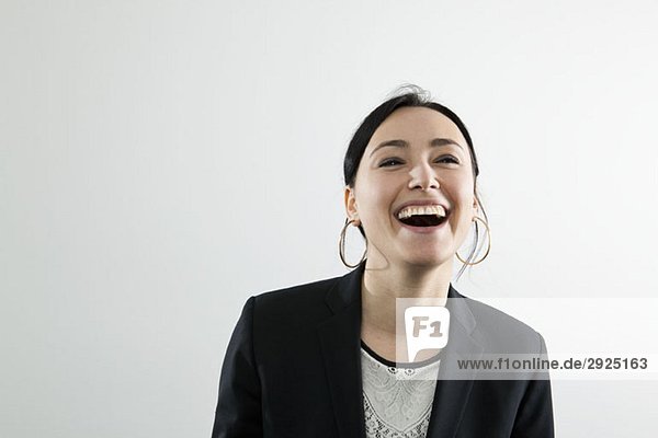 A businesswoman laughing  portrait