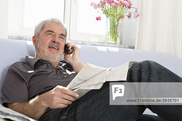 A senior man talking on a mobile phone