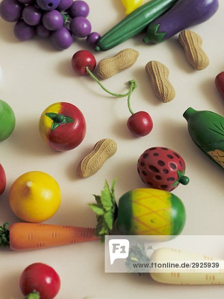 Arrangement of toy fruits and vegetables