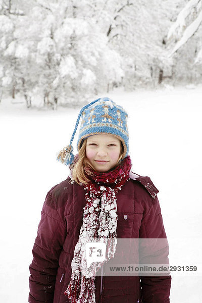 Girl covered in deep snow