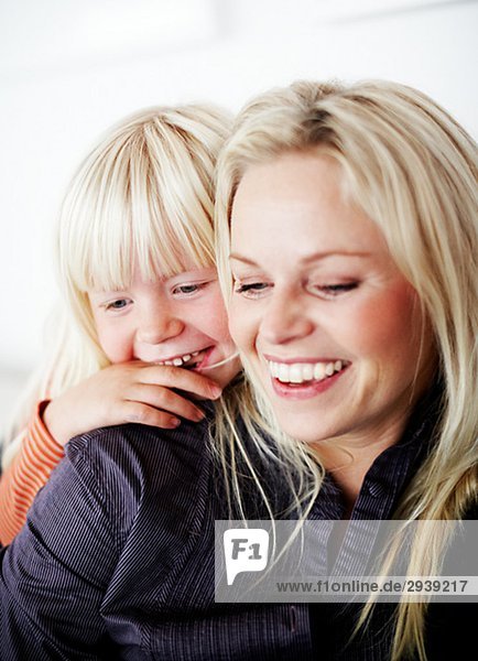 Smiling mother and daughter Sweden.