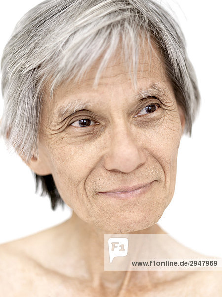 Portrait of a senior man on a white background