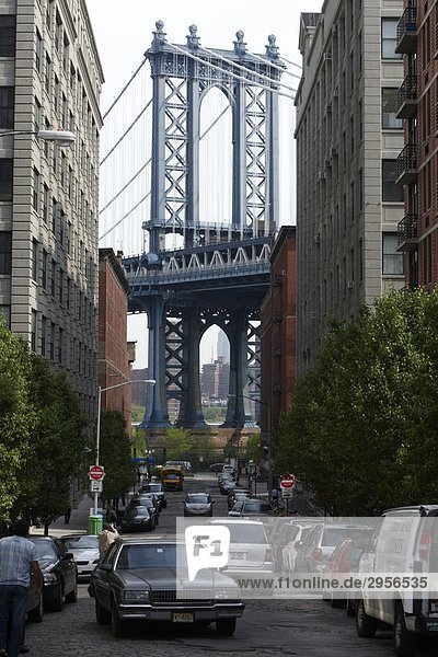 Headline: Urban canyon in Brooklyn with view to the Manhattan Bridge  New York City  USA