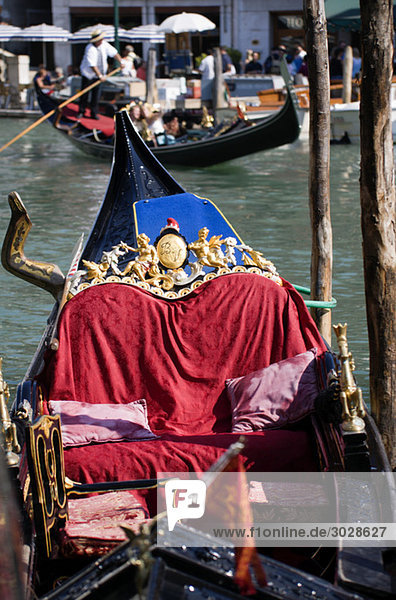 Italy  Venice  Gondola decoration  Gondolier in background