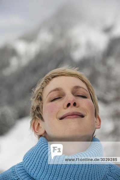 Italy  South Tyrol  Young woman  eyes closed  portrait